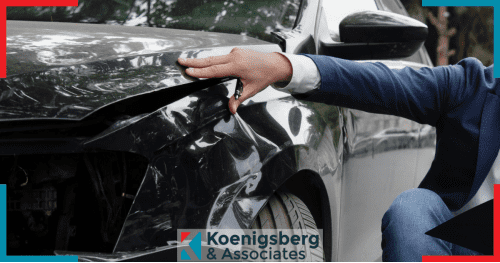 insurance adjuster checking damage on vehicle