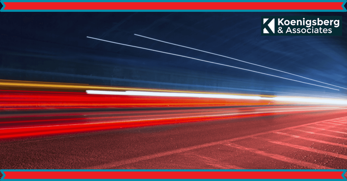 Long exposure image of cars driving by