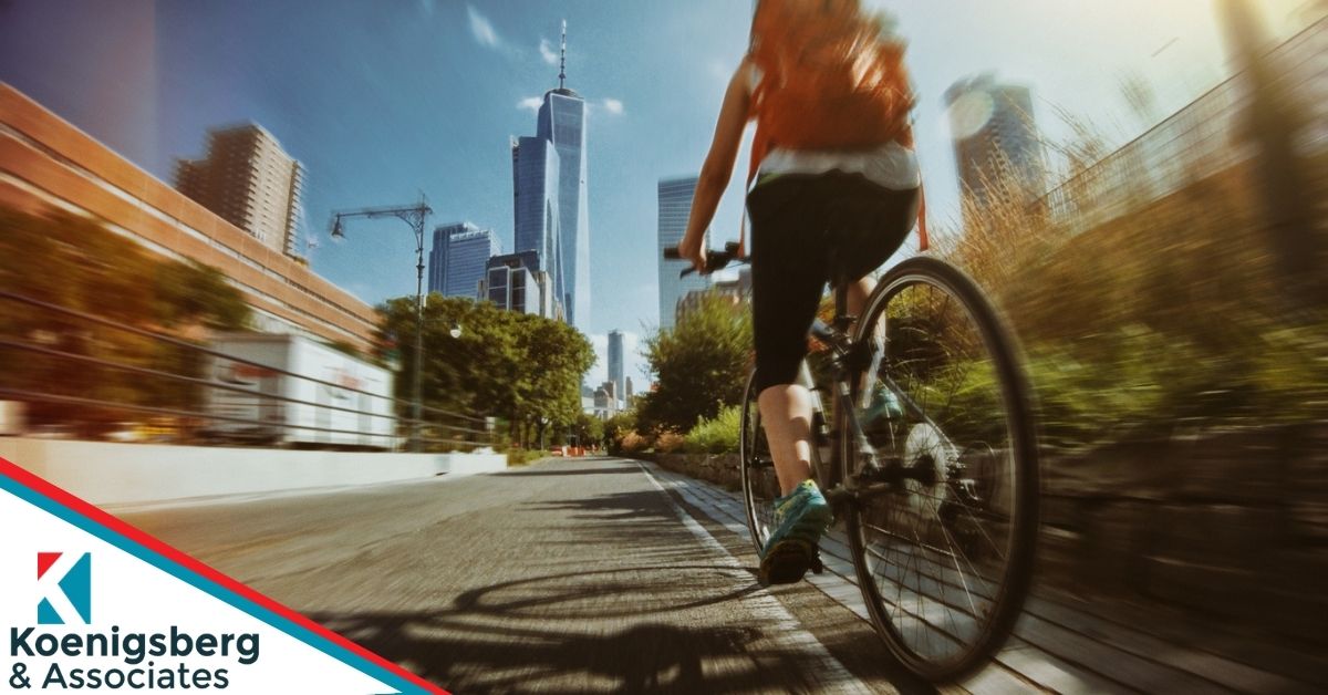 cyclist riding to a park