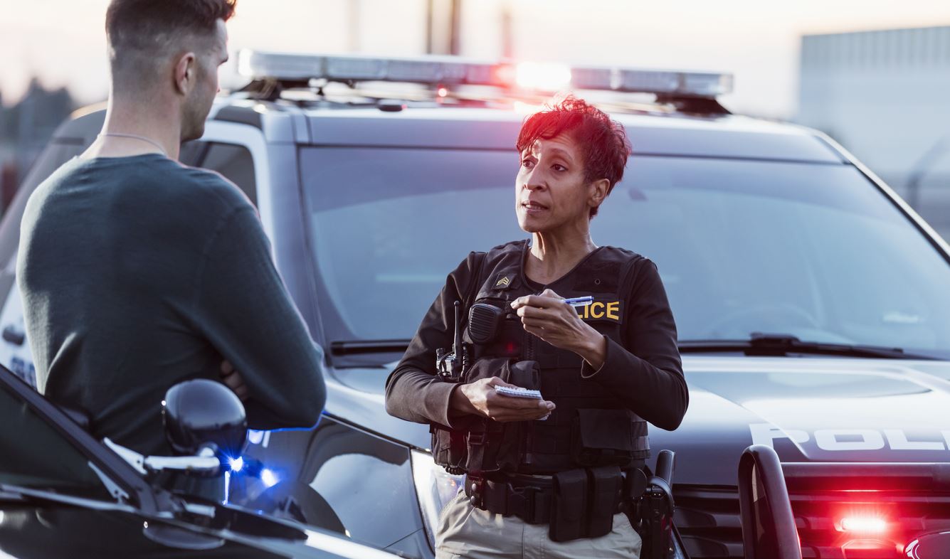 police officer taking a report