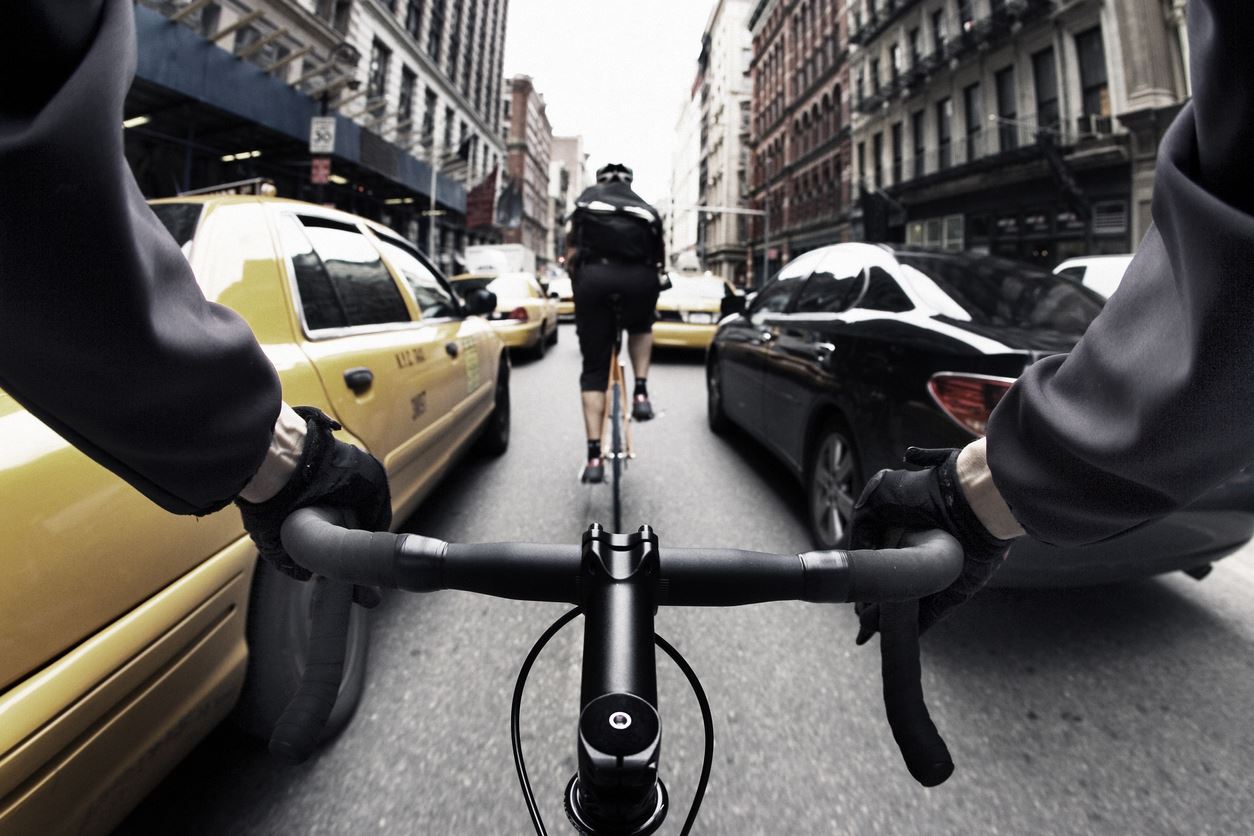 cyclists riding in traffic
