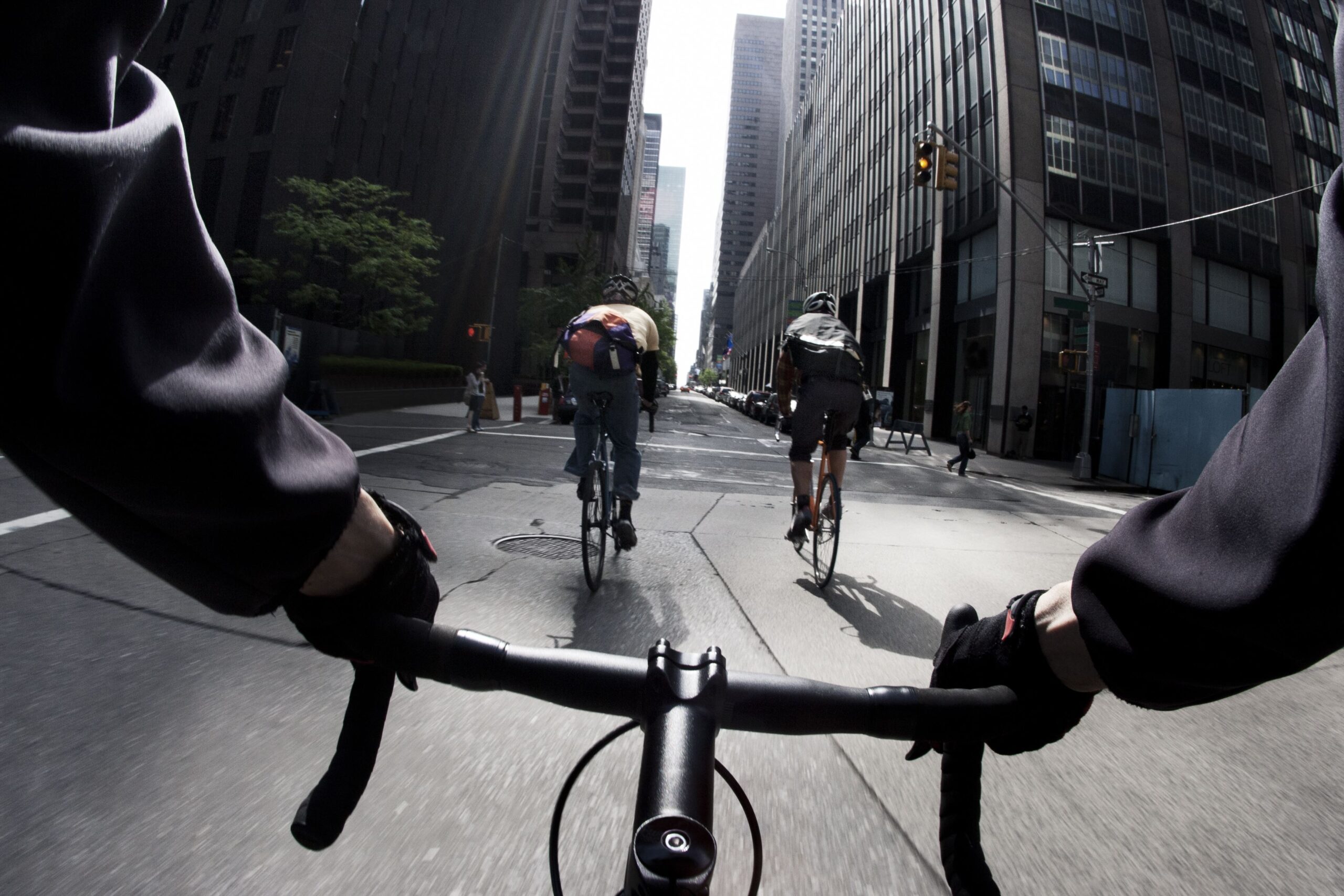 group of cyclists riding together