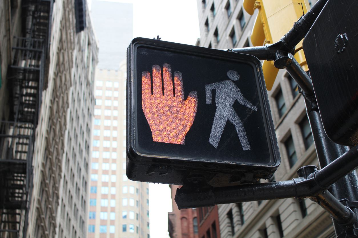 Don't walk sign on crossing light illuminated