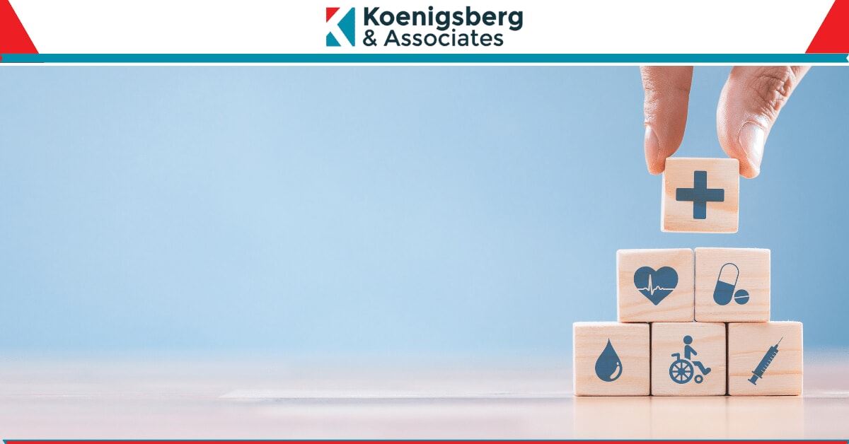 Wooden blocks with healthcare symbols on them