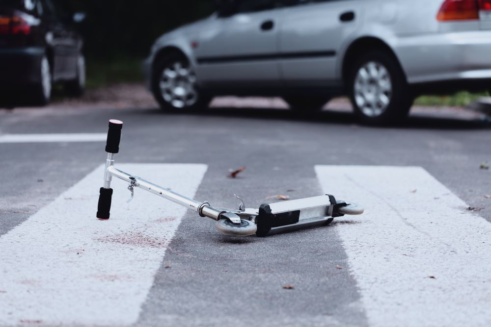Scooter involved with car accident.