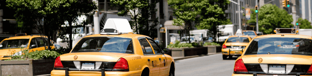 Taxi cabs in new york city along Park Avenue